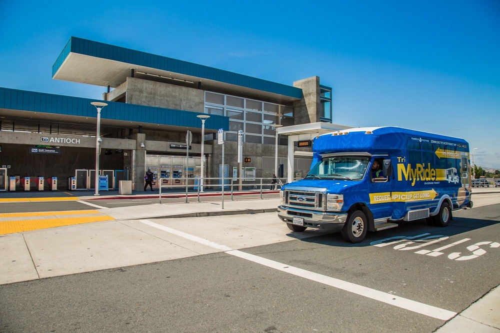 Tri Myride bus in front on bus station